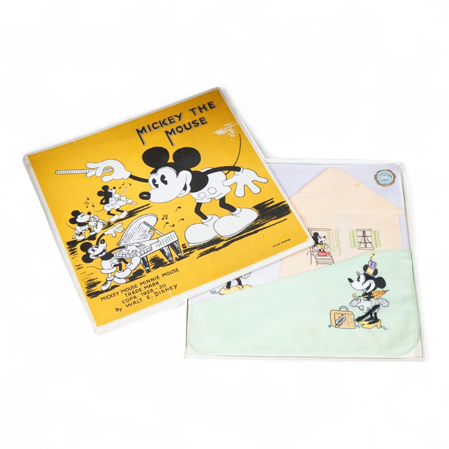 An early Walt. E. Disney Mickey Mouse and Minnie Mouse boxed, coloured embroidered handkerchief set. Box 20.5cm x 20.5cm square.
